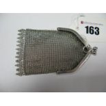 A Continental Ladies Mesh Link Purse, with cabochon inset clasp, stamped, suspension loop stamped "