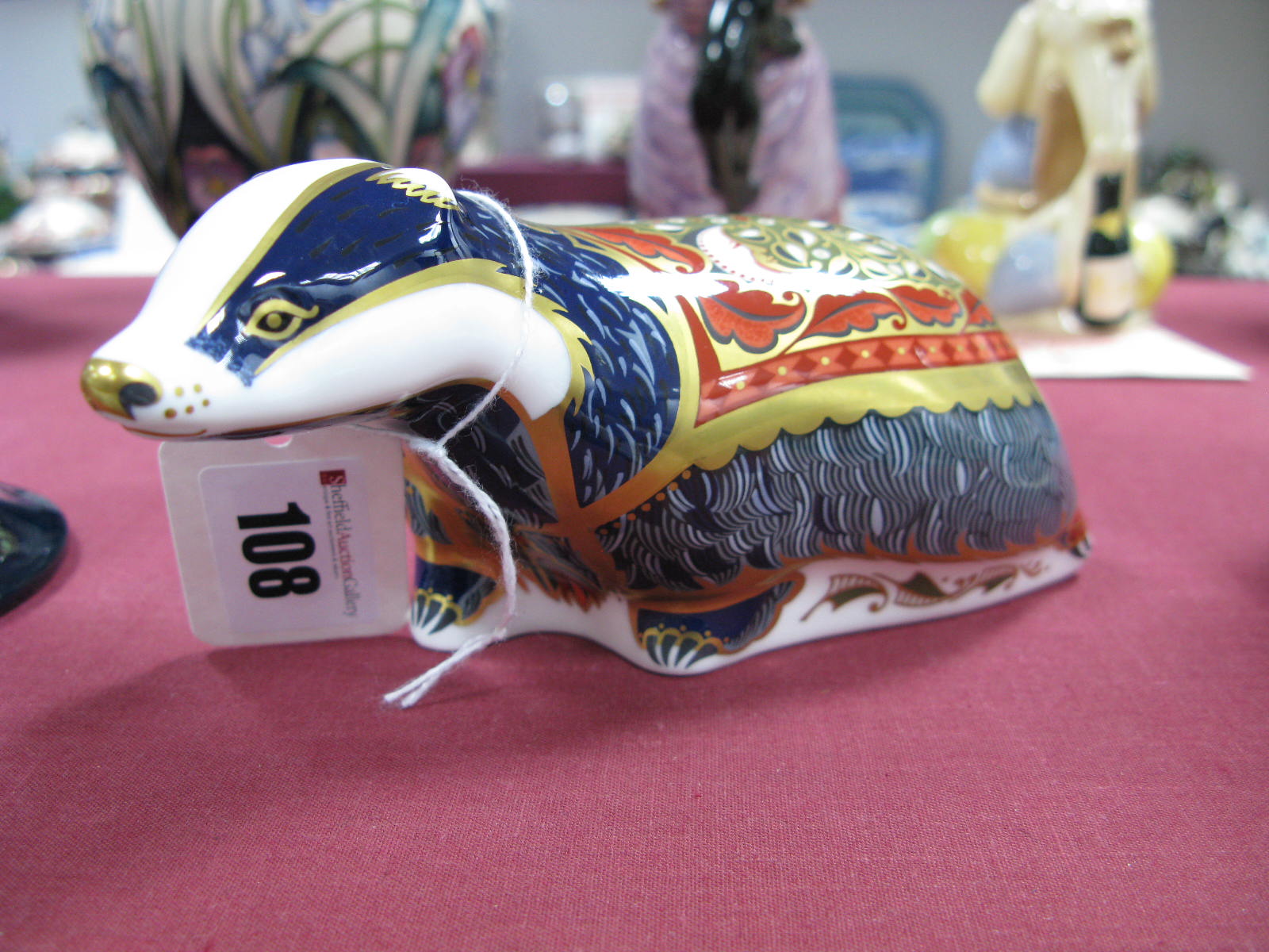 A Crown Derby Paperweight, modelled as Moonlight Badger, exclusively available to the Collectors