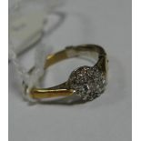 An 18ct Gold Cluster Dress Ring, illusion set.