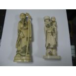 An Early XX Century Japanese Ivory Figure of a Sage, holding a long staff and holding a scroll,