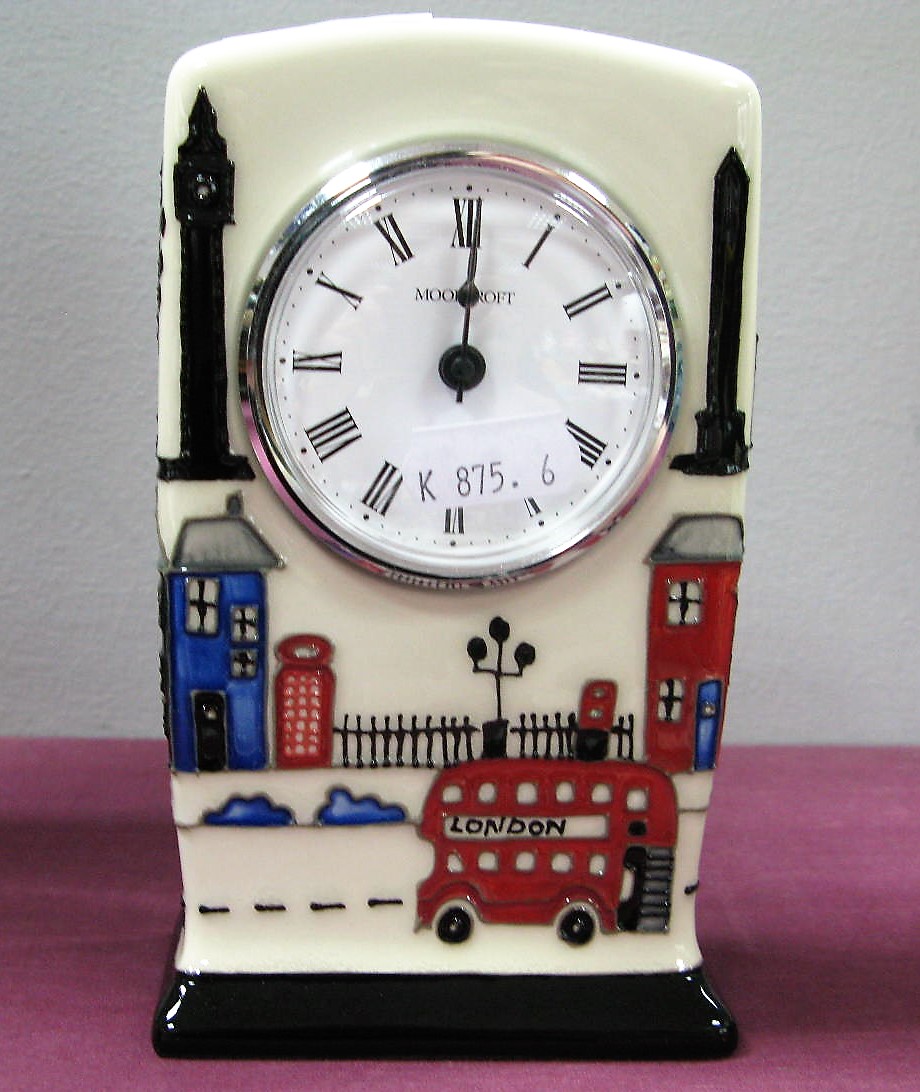 A Moorcroft Pottery Clock, painted in the Londinium pattern by Nicola Slaney, impressed and