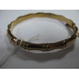 A 9ct Gold Bangle, of bamboo design.