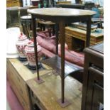 An Edwardian Mahogany Inlaid Oval octagonal Table, decorated with ribbons and foliage with a 'C'