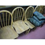 A Set of Four Light Elm Ercol Kitchen Chairs, with rail and hoop backs.