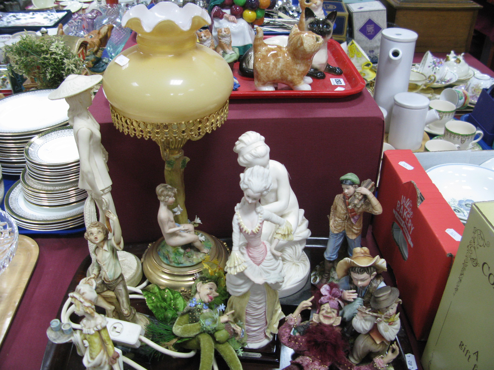 A Capo de Monte Table Lamp and Figures, Giamelli lady seated maiden, elves:- One Tray