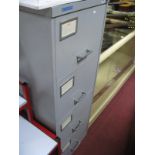 A Four Drawer Metal Filing Cabinet, with key.