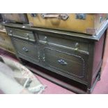 A 1930's Oak Mirrorback Sideboard, bevelled circular plate over two frieze drawers and cupboard