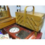 A Sewing Box and Contents, pine bathroom mirror, stained wood wall clock and a quantity of walking
