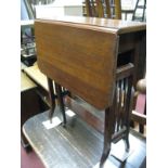 An Early XX Century Mahogany Sutherland Table, with drop leaves, shaped legs.