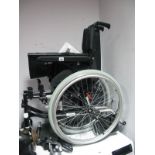 *WITHDRAWN* An Invacare Collapsible Wheelchair and accessories.