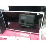 Sony Flatscreen Television, model No. KDL-32W706B plus remote.