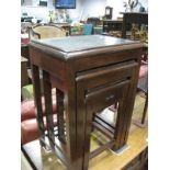 Nest of Three Mid XX Century Hardwood Coffee Tables, glass inset covers to carved tops.