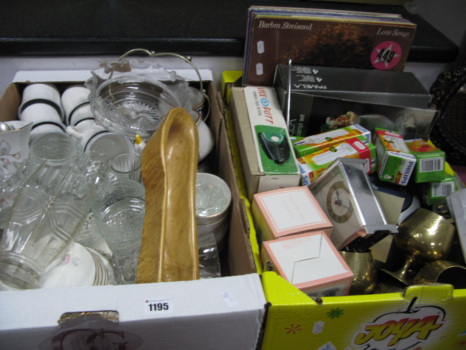 Records, CD player, (untested, sold for parts only), goblets, golf game, energy bulbs, dinner