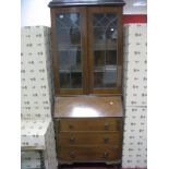 A Mahogany Bureau Bookcase, leaded astragal glazed doors over fall front with brushing slides and