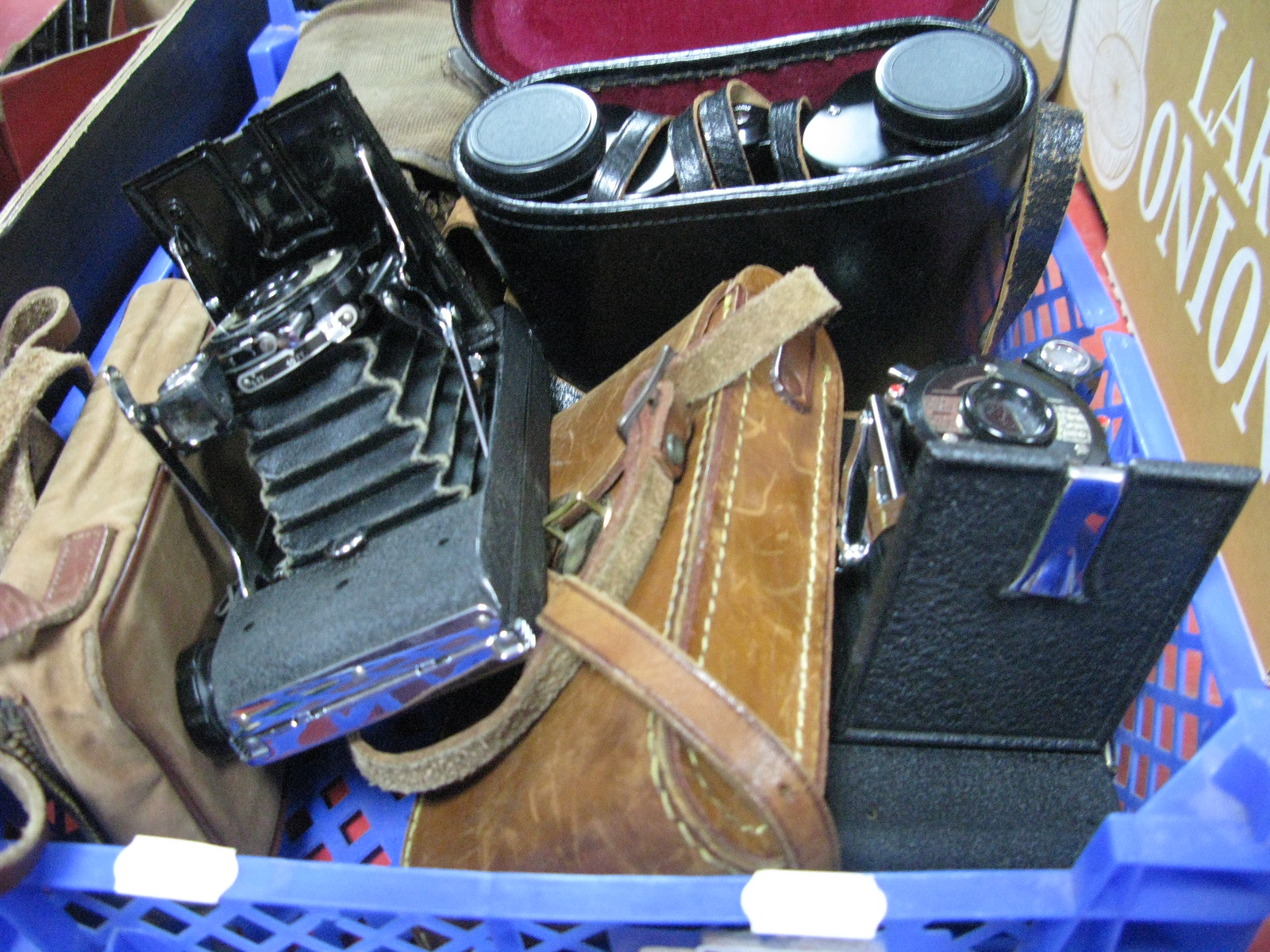 A Pair of Optimax 8 x 30 Cased Binoculars, a Penguin Eight 20 folding camera, further penguin