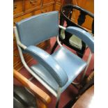An Early XX Century Ebonised Tub Chair, mid XX Century tubular metal framed example. (2)