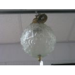 A Frosted Glass Globular Ceiling Light, with gilt metal mounts.