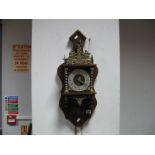 A Dutch Style Weight Driven Wall Clock, mahogany casing with brass appliques.
