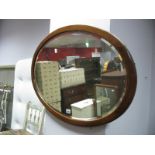 An Edwardian Inlaid Mahogany Framed Oval Bevelled Wall Mirror.