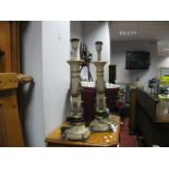 A Pair of Antiqued Columnar Table Lamps, moulded decoration of swags and foliage, circular bases (