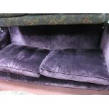 A Brushed Purple Velvet Four Seater Sofa, on oak tapering squared squat feet, approximate length