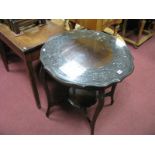 An Early XX Century Window Table, with a carved border, on cabriole legs, with undershelf.