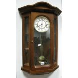 Wm. Widop Wall Clock, with Westminster chimes movement.