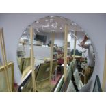 A Large Circular Wall Mirror, engraved foliate border, diameter 91cm.