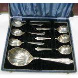 A Set of Six Hallmarked Silver Dessert Spoons, Sheffield 1935; together with a matching serving