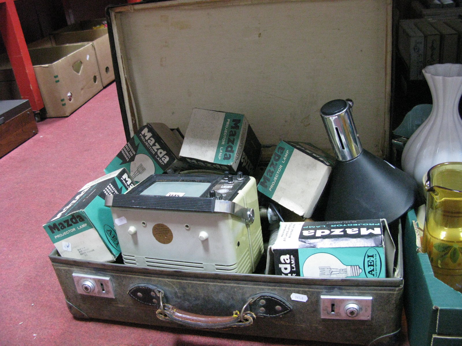 A Mid XX Century Suitcase, containing Vega 342 TV, projector lamps, desk lamp, motor, Gem Pathescope