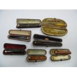 Three 9ct Gold Mounted Cheroot Holders, cased; together with "18GP" mounted example, etc. (7)