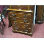 A Later XX Century Hardwood Chest of Drawers, of small proportions, tooled tan leather brushing