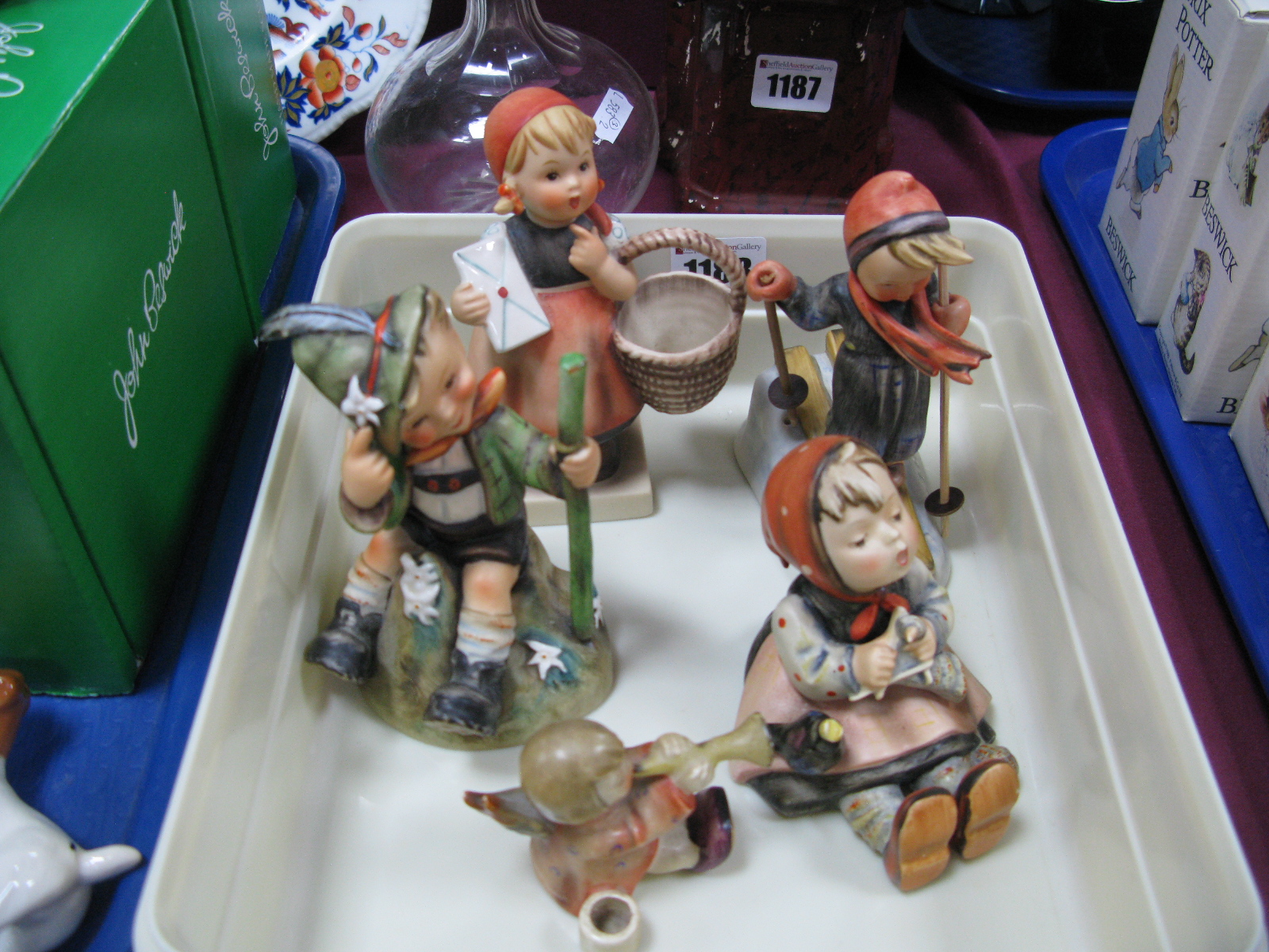 Hummel Pottery Figures, 'Meditation', 'Skier', 'Elf Boy', (repaired), 'Girl Knitting', 'Angel