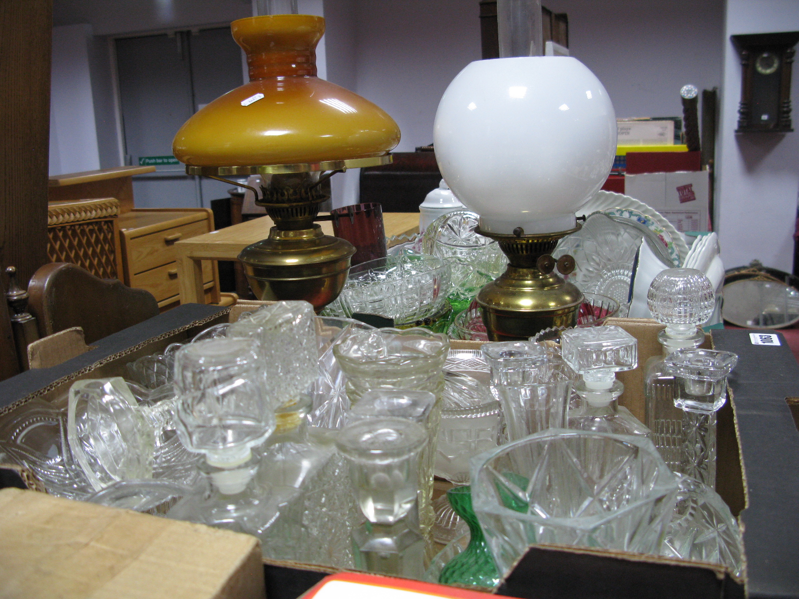 Decanters, other glassware:- One Box two brass oil lamps.