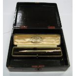 Eversharp Engine Turned Pencil, in a 'Waterman's Ideal' Fountain Pen case; together with a lacquered