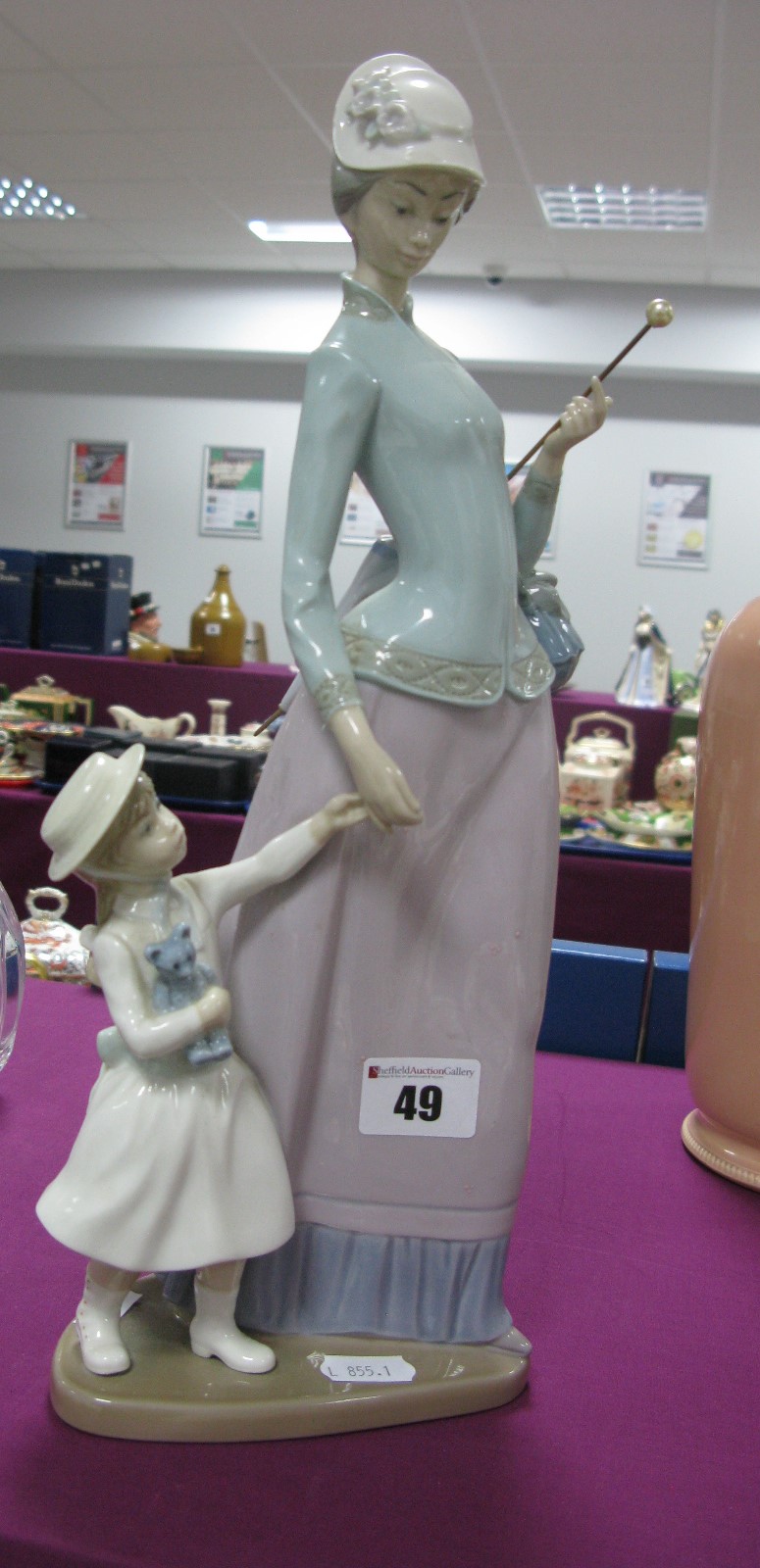 Lladro Model of a 'Lady Walking with Girl Holding a Teddy bear, (1978-85).