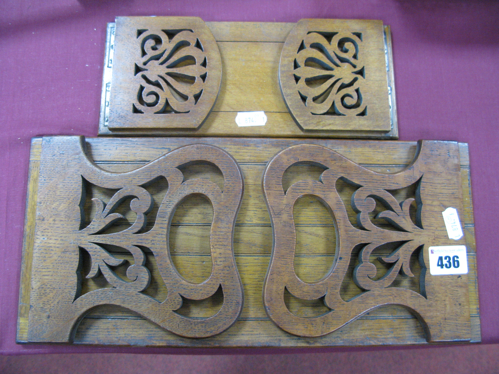 An Oak Extending Book Trough, with pierced sides, 63.5cm open, another similar smaller.