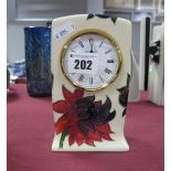 A Ruby Red Clock, shape CLI, 16cm high.