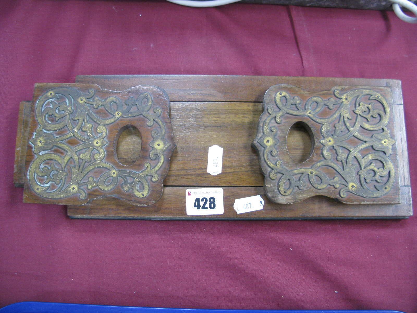 A Walnut Extending Book Trough, with pierced brass ends and stamped 'Betjemann's Self Closing Book