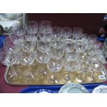 A Suite of Stemware, the bowls engraved with stylised fruiting vines, including ten large wines,