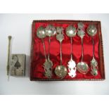 A Set of Six Tea Spoons, in a fitted box, together with a lighter, detailed as an ace of spade