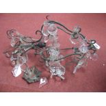 A Continental Five Branch Chandelier, having pear shape floret and faceted lustre drops, with