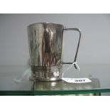 A Hallmarked Silver Mug, HA Sheffield 1938. of plain tapering cylindrical form, with reeded band and