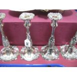 A Set of Four Decorative Plated Candlesticks, each with leaf scroll highlights in relief, 24.8cm
