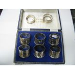 A Matched Set of Five Hallmarked Silver Napkin Rings, HG&S Birmingham 1974, 1975 in a fitted case,