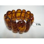 A Modern Amber Coloured Bracelet, elasticated.