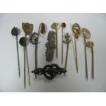 XIX Century and Later Stickpins, including gold stone, engraved shield, anchor etc, two brooches.