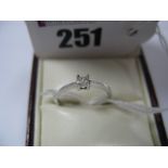 A Modern Princess Cut Single Stone Diamond Ring, four claw set, stamped "9k" "DIA""0.10".
