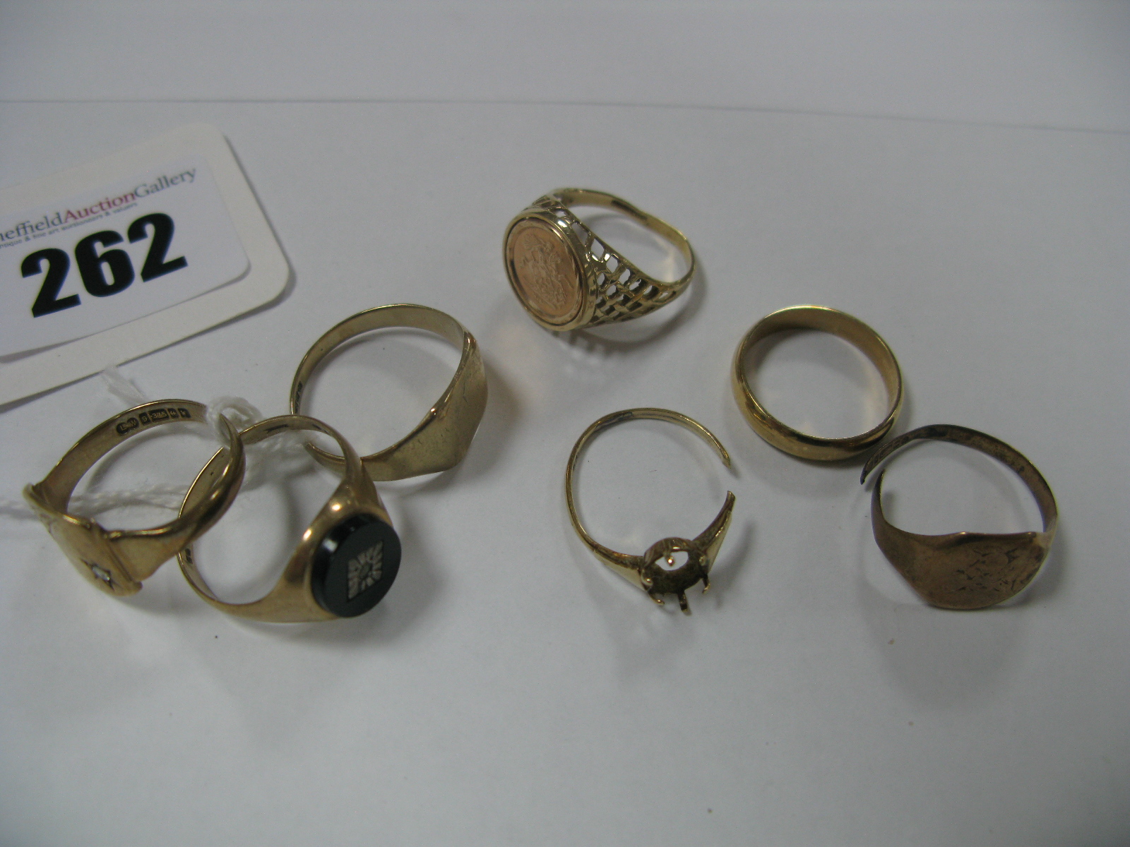 Two 9ct Gold Signet Style Rings, a 9ct gold plain wedding band, two rings (cut), etc. (7)