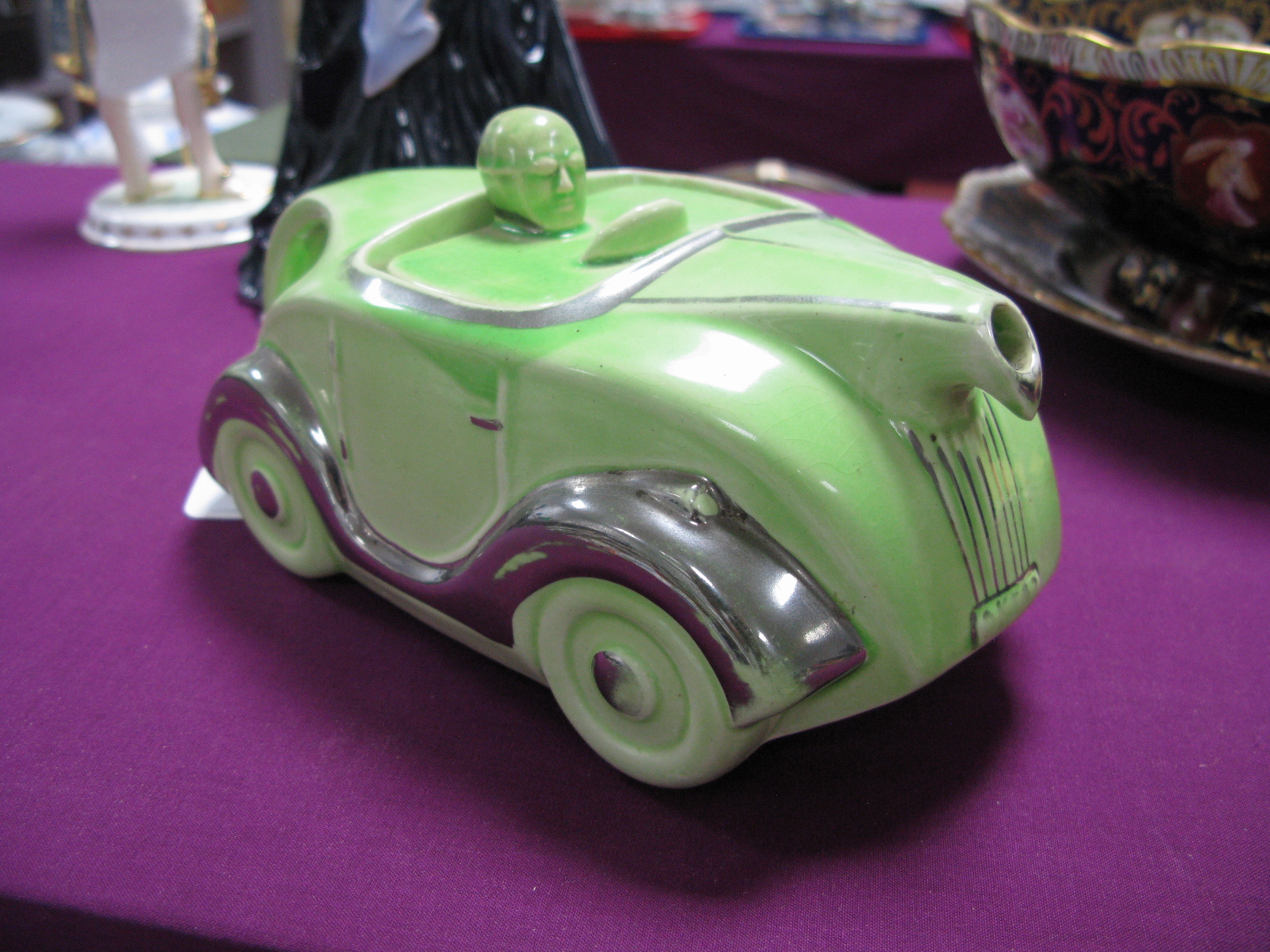 An Early XX Century Art Deco Style Teapot, in the form of a racing car.